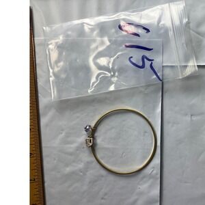 Gold Tone Bangle Bracelet with Clear and Purple Gemstones